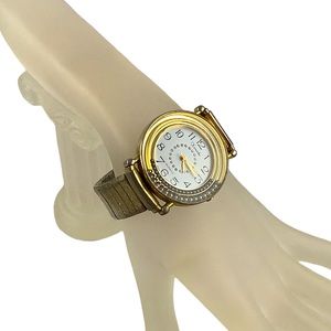 Vintage Xanadu Womens Goldtone Stainless Steel Quartz Articulating Flex Watch